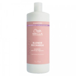 Geltoną atspalvį neutralizuojantis plaukų &scaron;ampūnas Wella Invigo Blonde Recharge Shampoo 1000ml