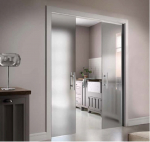 Paslėptoms stumdomoms durims su apvadais skirtas komplektas SCRIGNOTECH DOUBLE GLASS gipso sienai 2100x1400x125 (gipso profilis 100mm pločio) be stiklo.