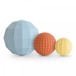 Mushie sferinis sensorinis sustatomas žaislas Powder Blue