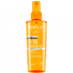Bronzinį įdegį skatinantis aliejus BIOXCIN SUNCARE BRONZING OIL SPF 15, 200ml (-50% perkant 2 vnt.)