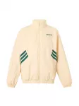 ADIDAS ORIGINALS Demisezoninė striukė 'Munich 93' &scaron;ampano / smaragdinė spalva