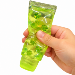 Antistresinis žaislas Squishy &ndash; dantų pastos tūbelė su dobilais
