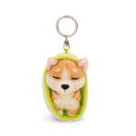 NICI SLEEPING PETS Raktų pakabutis-korgis žaliame krep&scaron;elyje, 8 cm