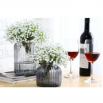 Gypsophila gėlių kompozicijų dekoravimas Namų netikrų gėlių nuotaka, laikanti gėles