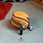 Retro augalinio rauginimo odinė piniginė monetoms: Natūralios alyvuoto va&scaron;ko karvės odos ausinių laikymo krep&scaron;ys