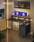 VASAGLE ra&scaron;omasis stalas su audinio stalčiais, kompiuterio stalas su monitoriaus laikikliu, LED ap&scaron;vietimu, 55 x 135 x 90 cm, įmontuoti elektros lizdai, 2 USB-A prievadai, namų biurui juoda