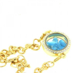 Pierres et Min&eacute;raux. Bracelet Apatite bleu neon brut mod&egrave;le M&eacute;daillon 25 mm. Couleur Or.