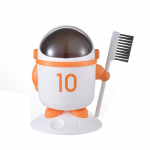 Buitinė astronauto formos plastikinė &scaron;iuk&scaron;liadėžė su dangčiu Biuro bendrabučio miegamasis Mielas kūrybingas atverčiamas popierinis krep&scaron;elis Touch &scaron;iuk&scaron;liadėžė oranžinė