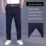 Vyri&scaron;kos kamufliažinės darbo kelnės &ndash; patvarios, atsparios ne&scaron;varumams, laisvai prigludusios, skirtos naudoti lauke ir statybose 2XL/180