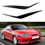 Hyundai Coupe (03-06) Priekinių žibintų antakių lipdukai - 1 pora, modifikuoti derva None