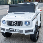 Mercedes-Benz G-Class vaiki&scaron;kas elektrinis visureigis su nuotolinio valdymo pultu, tinkamas berniukams ir mergaitėms - didelis keturiais ratais varomas, važiuojamas automobilis.