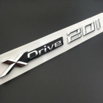 Automobilio durų &scaron;oninis sparnas XDRIVE X Drive 20 i 25 i 28i 30i 35i 40i 48i 50i emblema ženklelis lipdukas B/M/W X1 X3 X4 X5 serijai X Drive 50 I