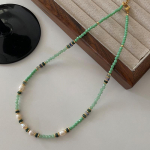 Žalias &bdquo;Dongling&ldquo; gėlavandenių perlų karoliai, supjaustyti veidui, soros karoliukų kaklo grandinėlės papuo&scaron;alai, megztinis su grandinėle moterims