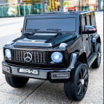 Mercedes-Benz G-Class vaiki&scaron;kas elektrinis visureigis su nuotolinio valdymo pultu, tinkamas berniukams ir mergaitėms - didelis keturiais ratais varomas, važiuojamas automobilis.