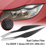 100 % tikro anglies pluo&scaron;to priekiniai žibintai antakiai, akių vokai, skirti BMW 3 serijos E90 E91 automobilio modeliavimui priekinio žibinto antakių apdaila Solid Color