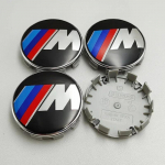 4 vnt. 68 mm 56 mm Automobilio ratlankių centrinių dangtelių ženklelis Logotipas Emblema BMW M X1 X3 X5 X6 X7 1 3 4 5 6 7 Serijoms E36 E39 E46 E60 E90 56mm