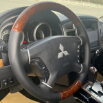 for Mitsubishi Pajero 2007-2014 Galant 2008-2012 Hand-Stitched Black Leather Peach wood grain Car Steering Wheel Cover 1