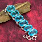 &Scaron;veicari&scaron;ko mėlyno topazo rankų darbo apyrankės papuo&scaron;alai, 925 prabos sidabro papuo&scaron;alai, brangakmenių sidabrinė grandinėlė-apyrankė, rankų darbo stilingi papuo&scaron;alai jai 8 Inches With Adjustable mėlyna