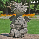 Miela mažo drakono medituojama statula, kuriai atrodo kitaip