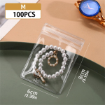 100 vnt., Papuo&scaron;alų mai&scaron;eliai nuo oksidacijos, Skaidrūs mai&scaron;eliai su užtrauktuku, Mažas papuo&scaron;alų organizatorius, Žiedų auskarų savaime užsisandarinantys papuo&scaron;alų pakavimo mai&scaron;eliai