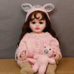 Realisti&scaron;kai implantuotų garbanotų plaukų atgimusi lėlė lėlė, gyva 55 cm, viso vinilo kūno imitacija lėlės dėvėjimo grožis rožinė kiaulė megzti drabužiai lėlė kūdikio žaislas