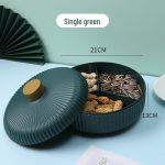 Lengvo prabangos apvalus džiovintų vaisių laikymo indas su dangteliu namų svetainės kavos staliukui, paprastas saldainių indas, naujo stiliaus vaisių lėk&scaron;tės stovas. žalia