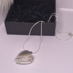 Medalionas &bdquo;Tylus jausmas&ldquo;