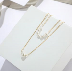 Kaklo papuo&scaron;alas ,,Pearls"