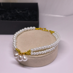 Rankų darbo apyrankė &bdquo;Baltųjų perlų magija&ldquo;