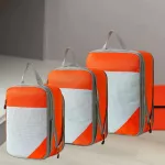 Kelioninis kompresinis rūbų dėklų rinkinys, oranžinis