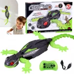 Nuotoliniu pultu valdoma GECKO sienomis vaik&scaron;tanti žaislinė driežė