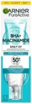 GARNIER Pure Active Fluid prie&scaron; trūkumus BHA + Niacinamide Kasdienis UV SPF50+ 40ml