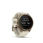 Garmin Fenix 9 Pro &ndash; 43 mm Rudeninio aukso titanas su kremine/prancūzi&scaron;kai pilka silikono apyranke