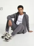 Sinsay - Tapered fit kelnės SNSY PERFORMANCE - tamsiai pilka