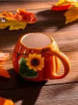 Sinsay - Puodelis su rudens motyvu - koralinė