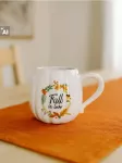Sinsay - Puodelis su rudens ra&scaron;tu - bly&scaron;kiai žalia