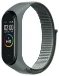 Beline i&scaron;maniojo laikrodžio dirželis Xiaomi Mi Band 3/4/5/6/7 | nailoninis | pilkas