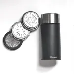 Microplane Universal Mill - juodas/skaidrus rankinis rotacinis tarka kietiesiems sūriams, &scaron;okoladui, rie&scaron;utams, prieskoniams