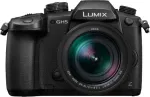 Panasonic Lumix DC-GH5LEG-K veidrodinis fotoaparatas su Leica DG Vario-Elmarit 12-60mm f/2.8-4 ASPH. POWER O.I.S. objektyvu, 20,3MP Micro Four Thirds, 4K 60p vaizdo įra&scaron;u, 5 a&scaron;ių Dual I.S. 2, Wi-Fi/Bluetooth, atsparus purslams ir &scaron;alčiui, juodas