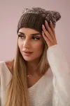 Moteri&scaron;ka žieminė kepurė su bumbulu ir fliso pamu&scaron;alu, kreminė
