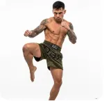Vyri&scaron;ki Muay Thai &scaron;ortai DBX Bushido Combatwear, tamsiai žali