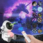 Astronautas žvaigždėto dangaus projektorius vaikams, led kosmoso nakties dangaus &scaron;viesos projektoriaus lempa nuotaikos &scaron;viesa su 12 projekcijų ir nuotolinio valdymo laikmačiu, naktinė žvaigždėto dangaus dekoracija, dovana vaikams