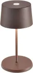 Zafferano, Olivia Mini lempa, ne&scaron;iojama ir įkraunama stalinė lempa su jutikliniu valdymu, tinkama svetainei ir laukui, reguliuojamas ap&scaron;vietimas, 2700-3000 K, auk&scaron;tis 22 cm, spalva Corten