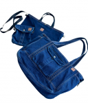 Kelioninis Kelioninių krep&scaron;ių komplektas: rankinis bagažas, i&scaron;imamas kompiuterio dėklas ir mažas krep&scaron;elis per petį, i&scaron; džinso