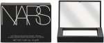 Nars &scaron;viesą atspindintys tvirtinimo milteliai presuoti, 10 g
