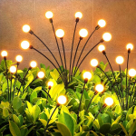 Lauko &scaron;viestuvai LED Starburst Firefly, saulės energija kraunami, 2 vnt.