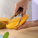 Mango meistras nerūdijančio plieno pjaustyklė ir skustukas.