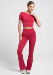 Besiūlės mikropluo&scaron;to tamprės su platėjančiomis kle&scaron;nėmis LEGGINGS FLARED Giulia, spalva winterberry