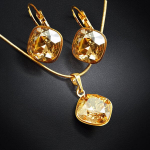 Komplektas "Akinantis spindesys IV (Golden Shadow)" su Swarovski kristalais