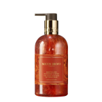 Skystas rankų muilas Molton Brown Marvellous Mandarin & Spice su citrusiniu kvapu, &scaron;venti&scaron;ku aromatu, &scaron;velniai valantis